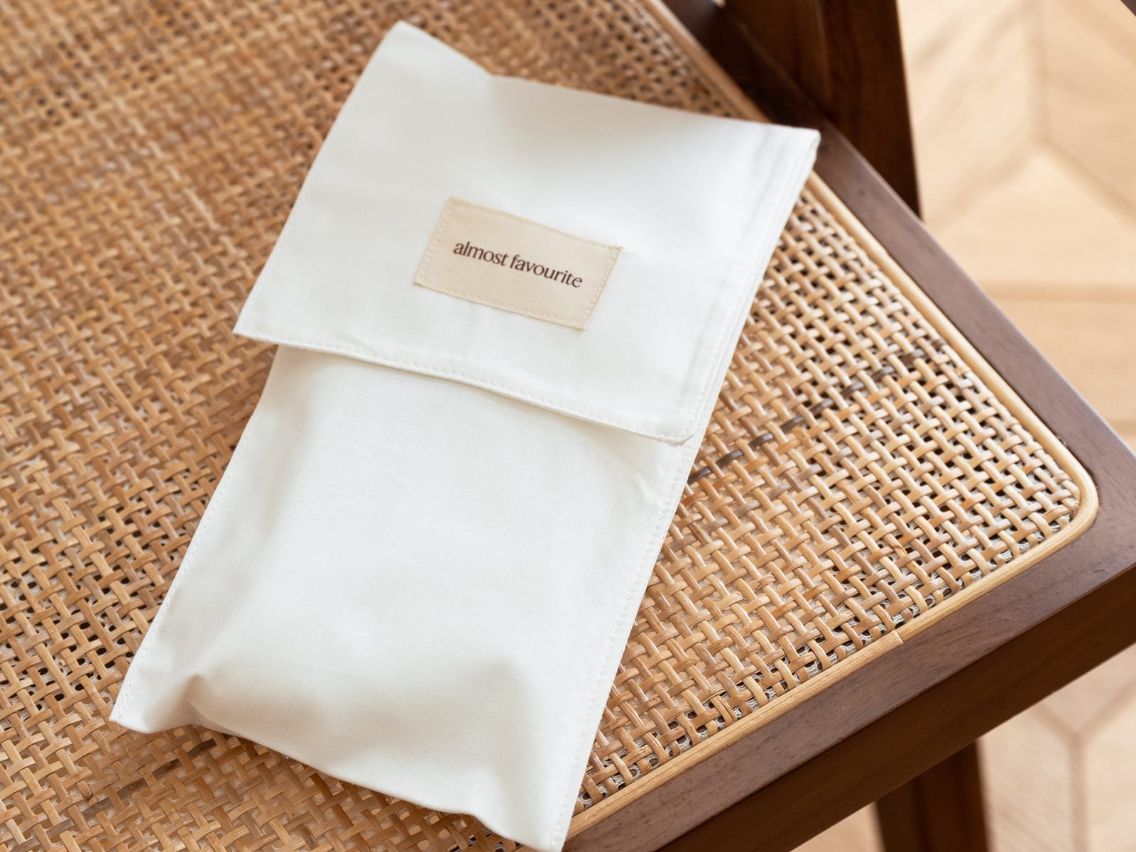 Almost Favourite calico pouch on a cane chair